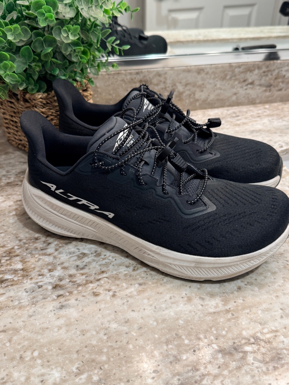 Altra women's Black Athletic Running Shoes with White Soles